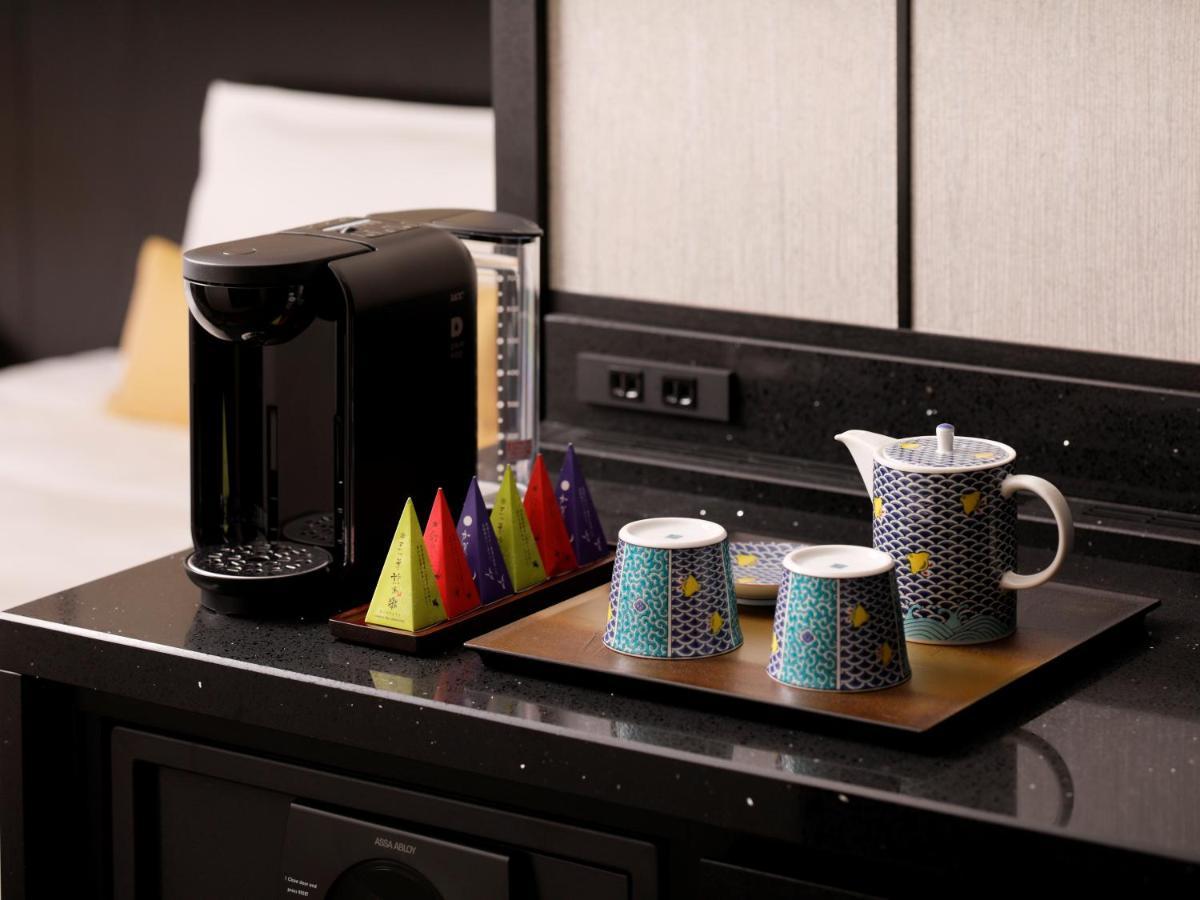 The Hotel Sanraku Kanazawa 21Th December 2022 Open Esterno foto A Nespresso coffee machine in a hotel room